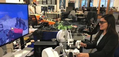 side angle shot of a person piloting the oceanone experience