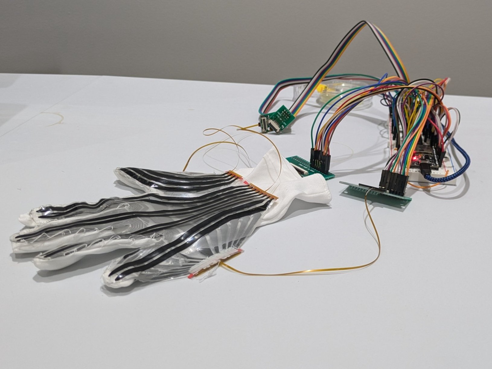 a closeup of the e-skin mesh, a wearable glove with electronics