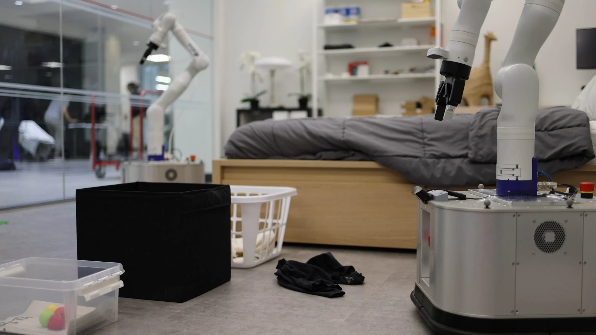 a side shot showing two house hero robots in action 