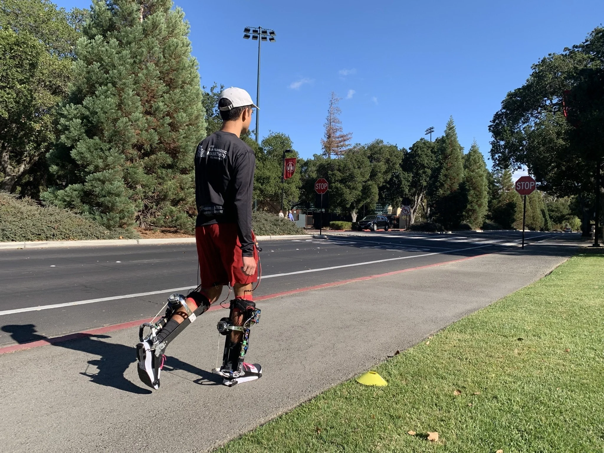 a far shot of a person walking with the super-ankle