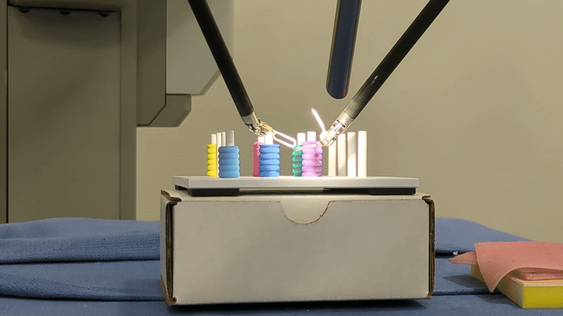 Teleoperated daVinci manipulating a tube demonstration