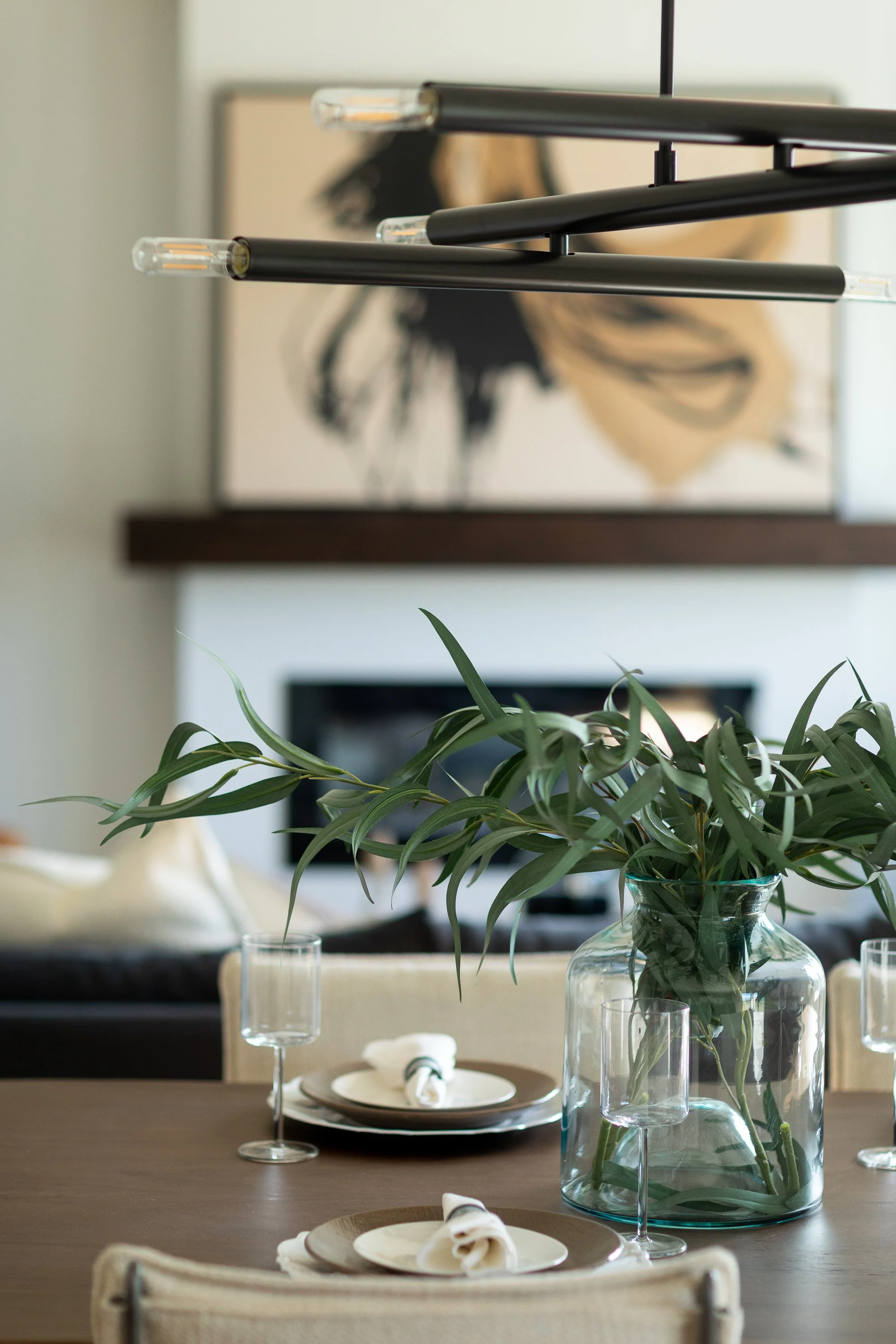 A staged open concept living and dining room that will be hosting an open house.