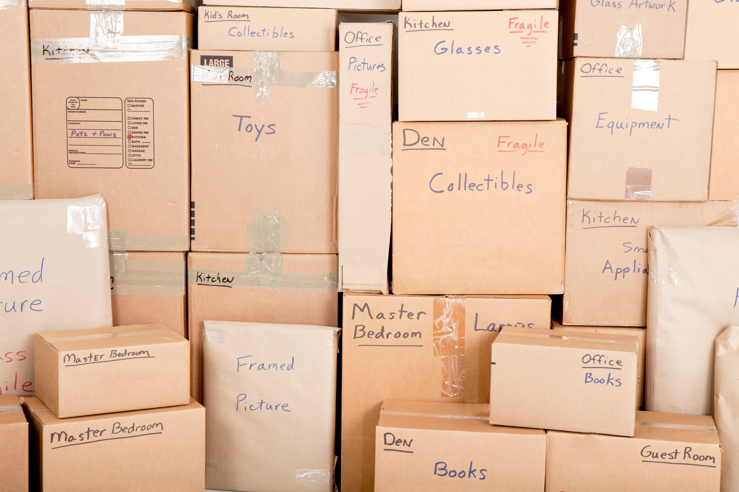 Moving boxes with labels to determine where the boxes go.