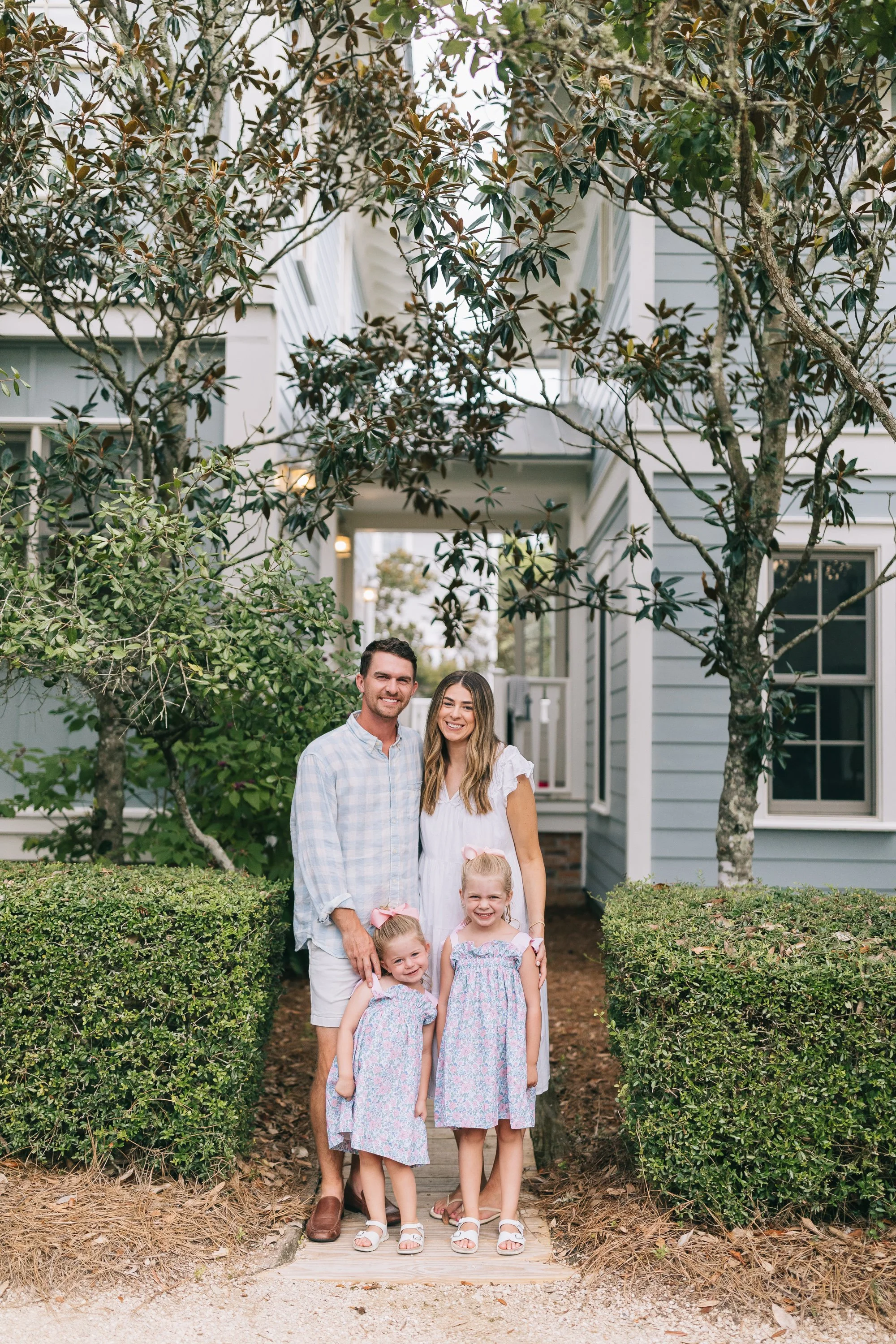 Bennett Arey at a Florida Rental Property with his wife, Alexis Arey and their two daughters.