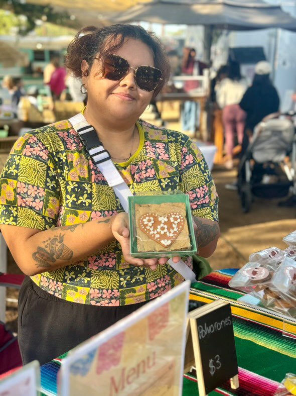 owner with cookie cake.jpg