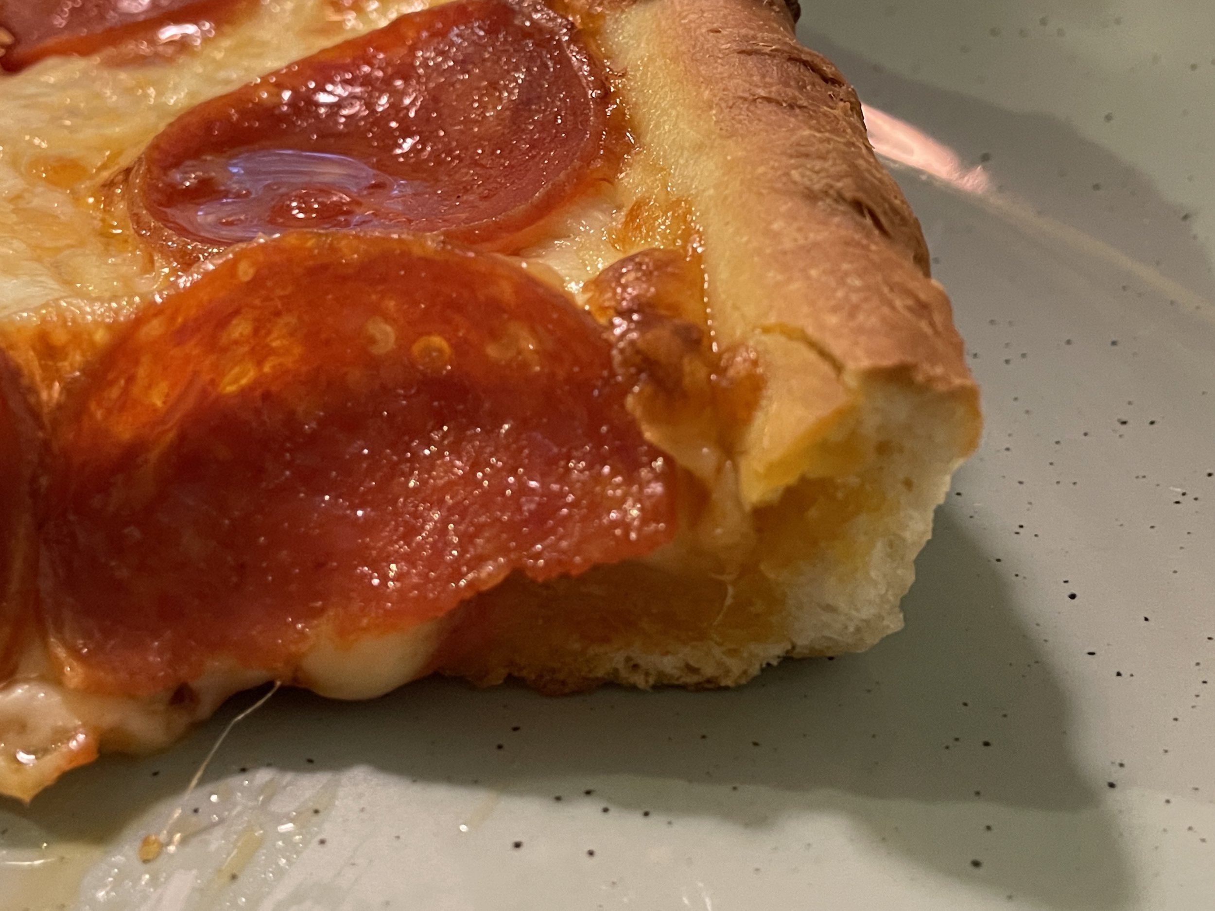 New England Pan Pizza has a thicker crust than New Haven