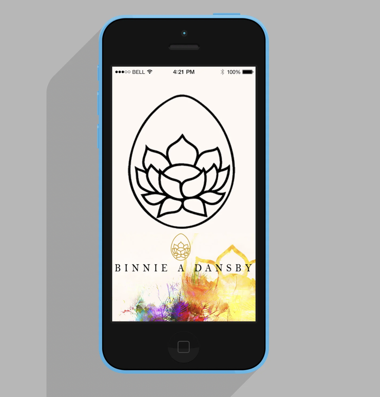Blue smartphone displaying an album cover with a black line drawing of a lotus flower inside an egg shape, colorful abstract background, and the artist's name "Binnie A Dansby".