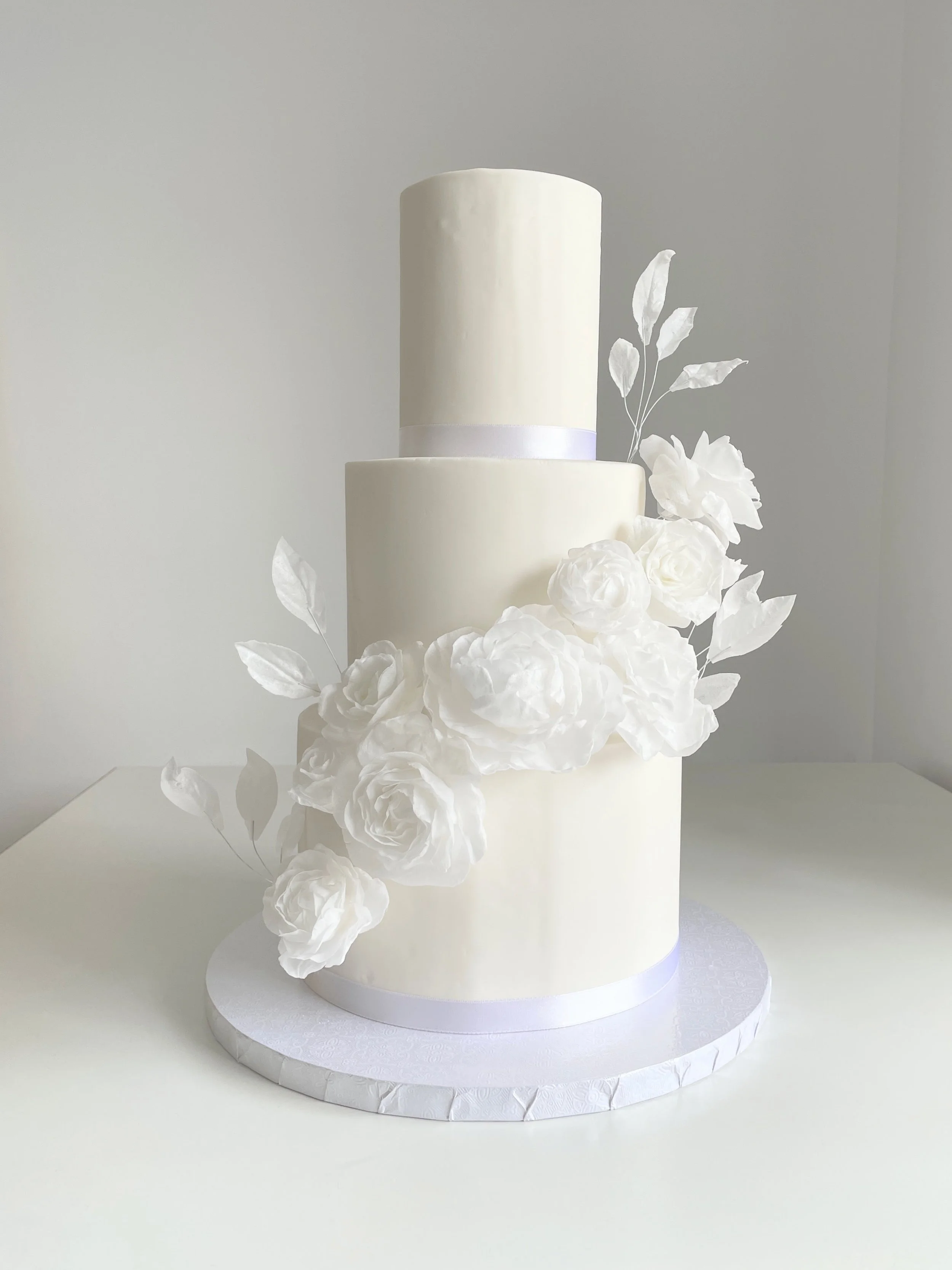 3 Tier White Fondant, Ribbons and Handmade Wafer Paper Flowers