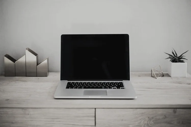 Kee Smith, messaging strategist and conversion copywriter, at her desk