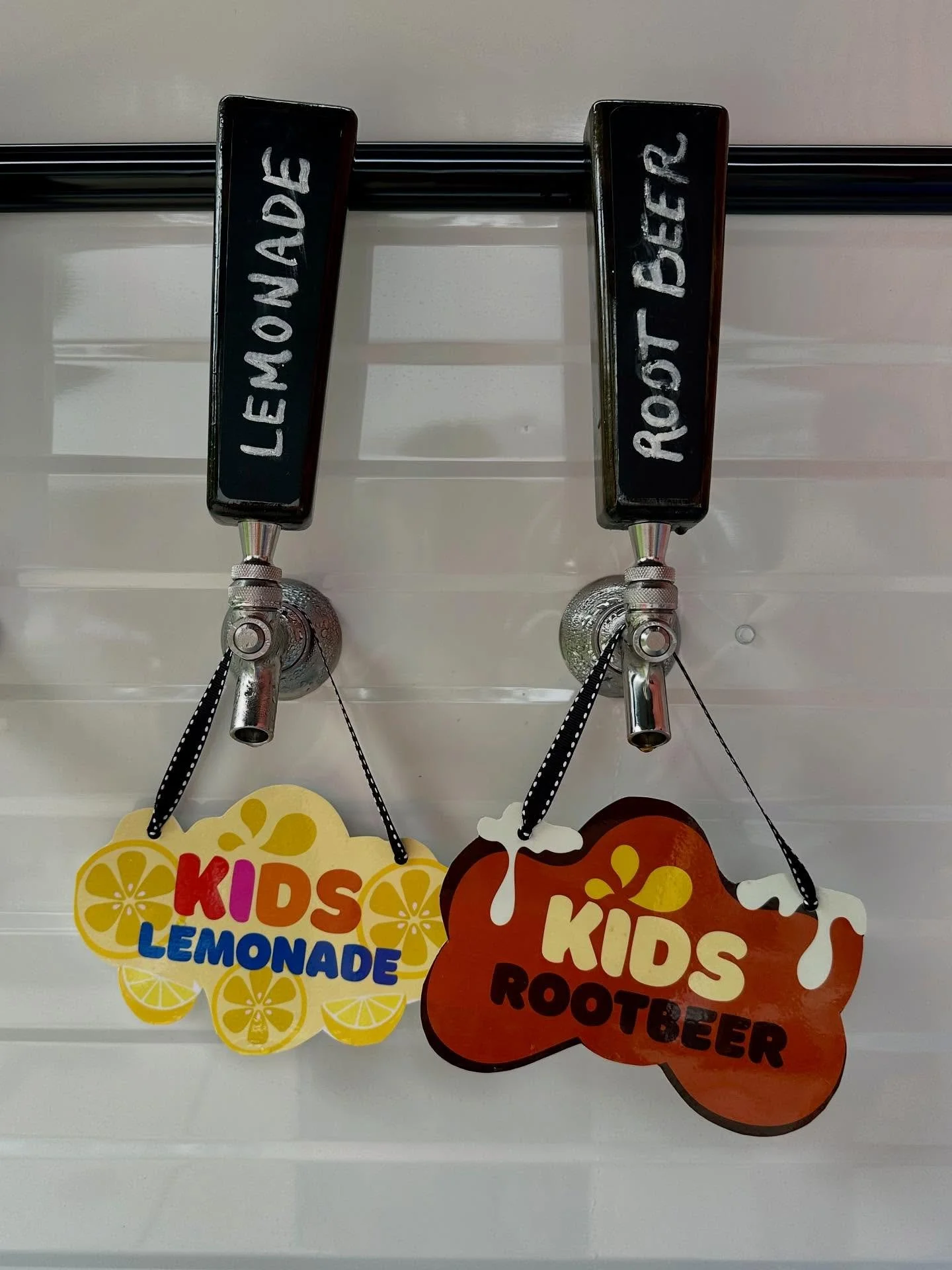 while the grown-ups sip their favorites, the kids get their own VIP treatment with ice-cold root beer and refreshing lemonade on tap!