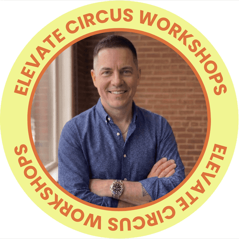 Head shot of Carl Mann in blue shirt with elevate circus workshops circular banner
