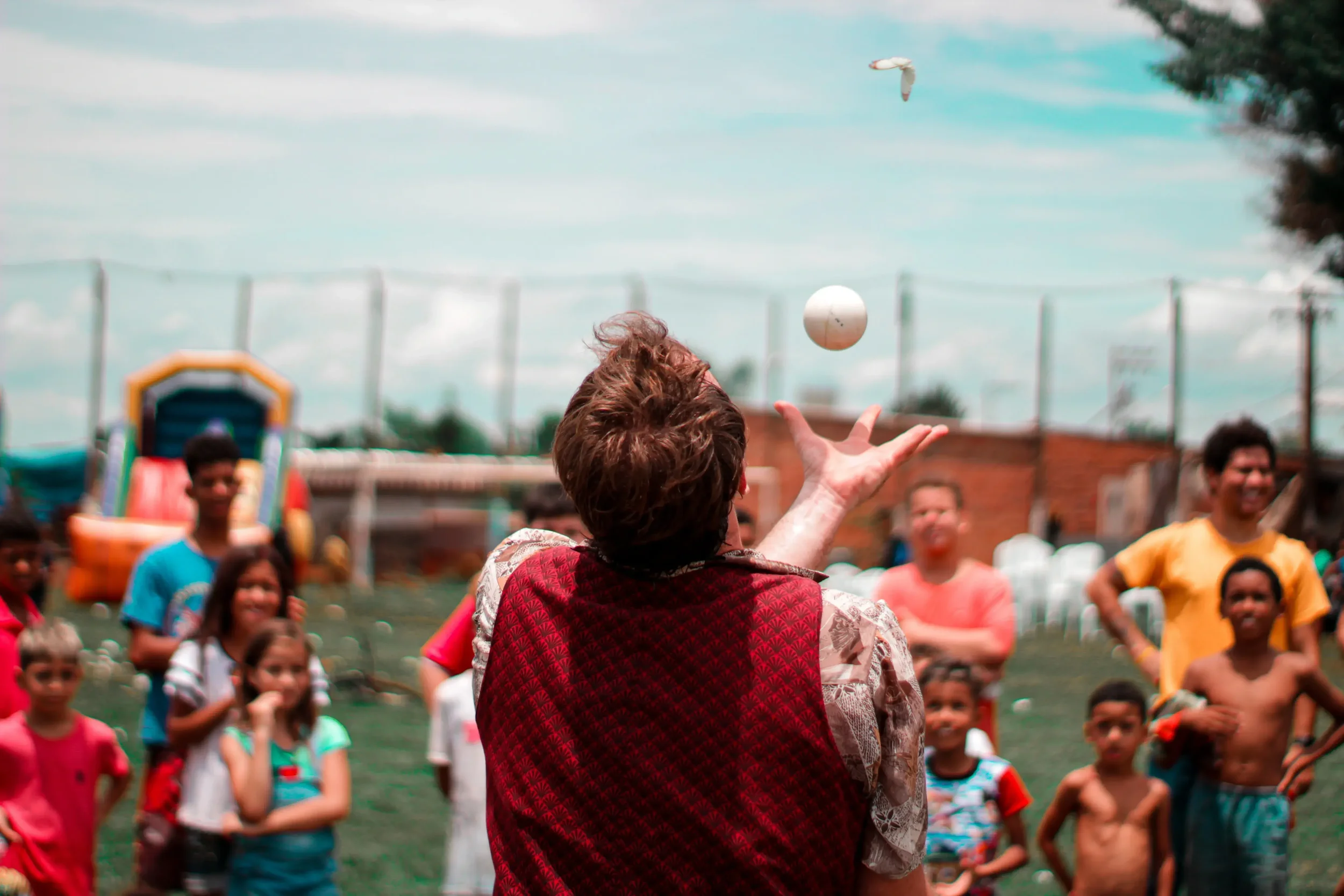 Professional circus skills workshop tutor juggling at a Glasgow school event