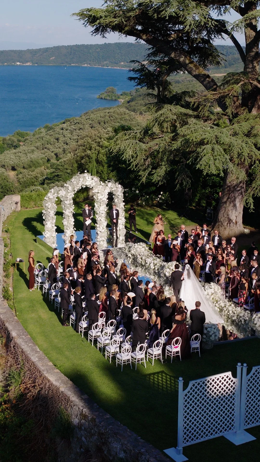 Filip and Sally's wedding ceremony overlooking Lake Bracciano at Castello Odescalchi di Bracciano, Italy