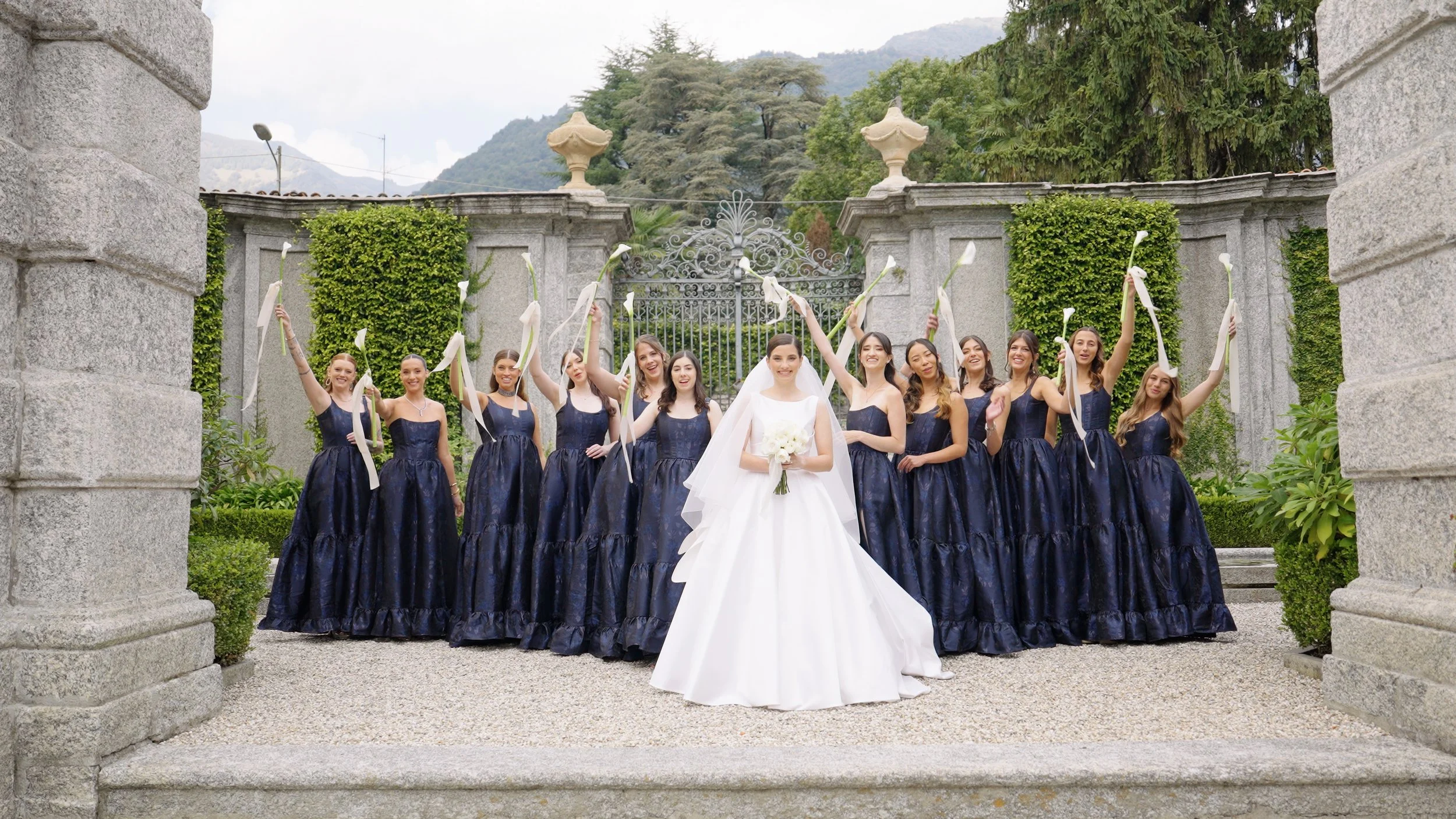 Bride with her bridesmaids at Villa Balbiano, Lake Como, sharing an intimate moment before the luxury wedding ceremony.