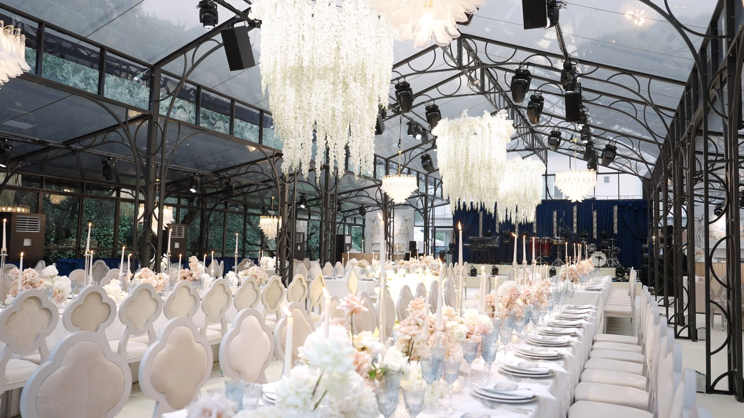 Luxury wedding reception setup at Villa Balbiano on Lake Como with elegant floral design and candlelit tables