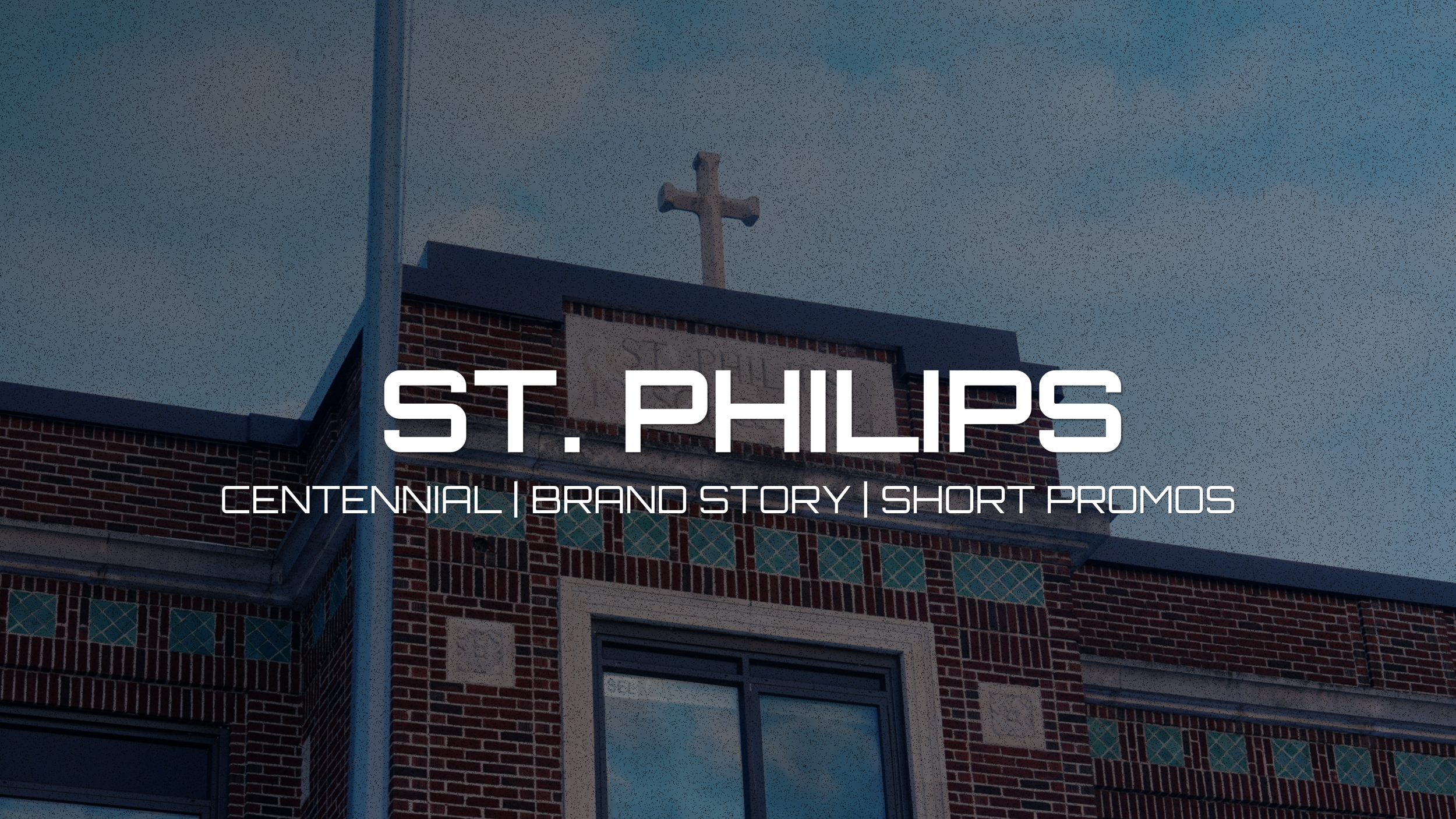 Close-up of a brick church building with a cross on top, and overlaying text that reads "St. Philips Centennial | Brand Story | Short Promos".