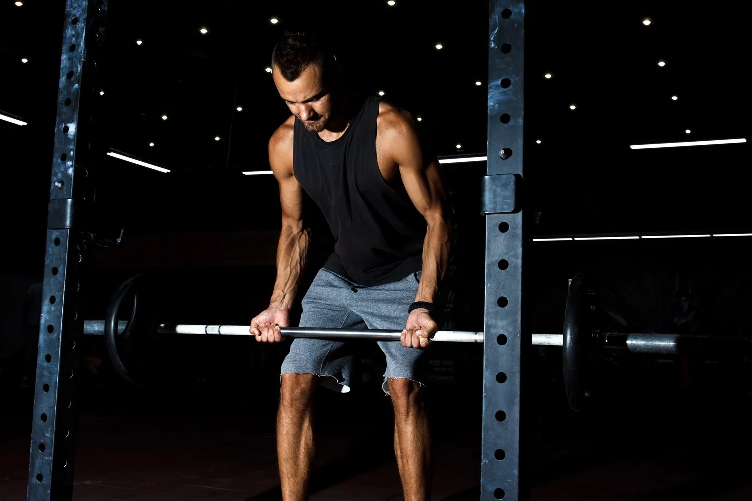 man performing a deadlift