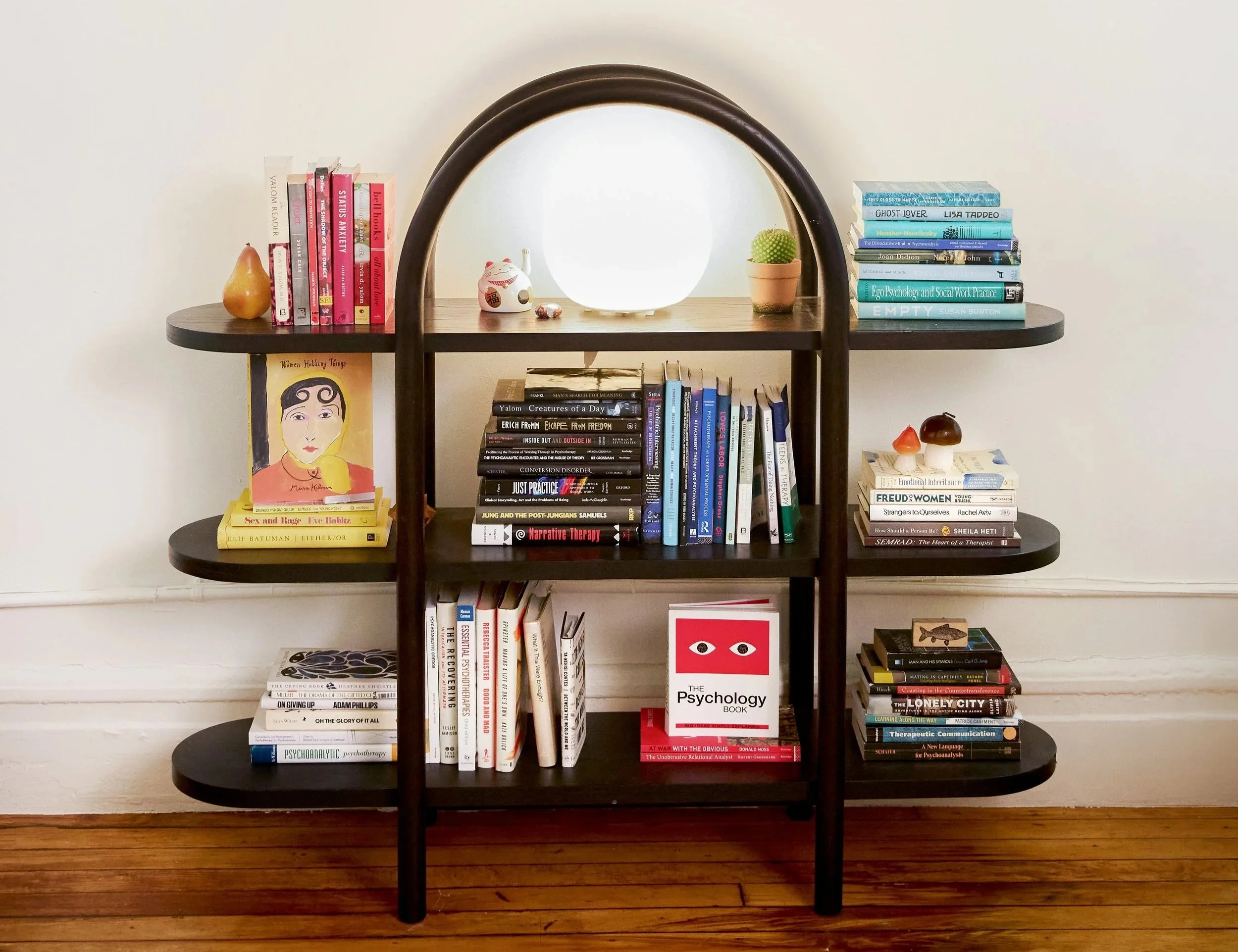 Therapy office bookshelf with psychoanalytic books Union Square NYC Julia Pressman LCSW