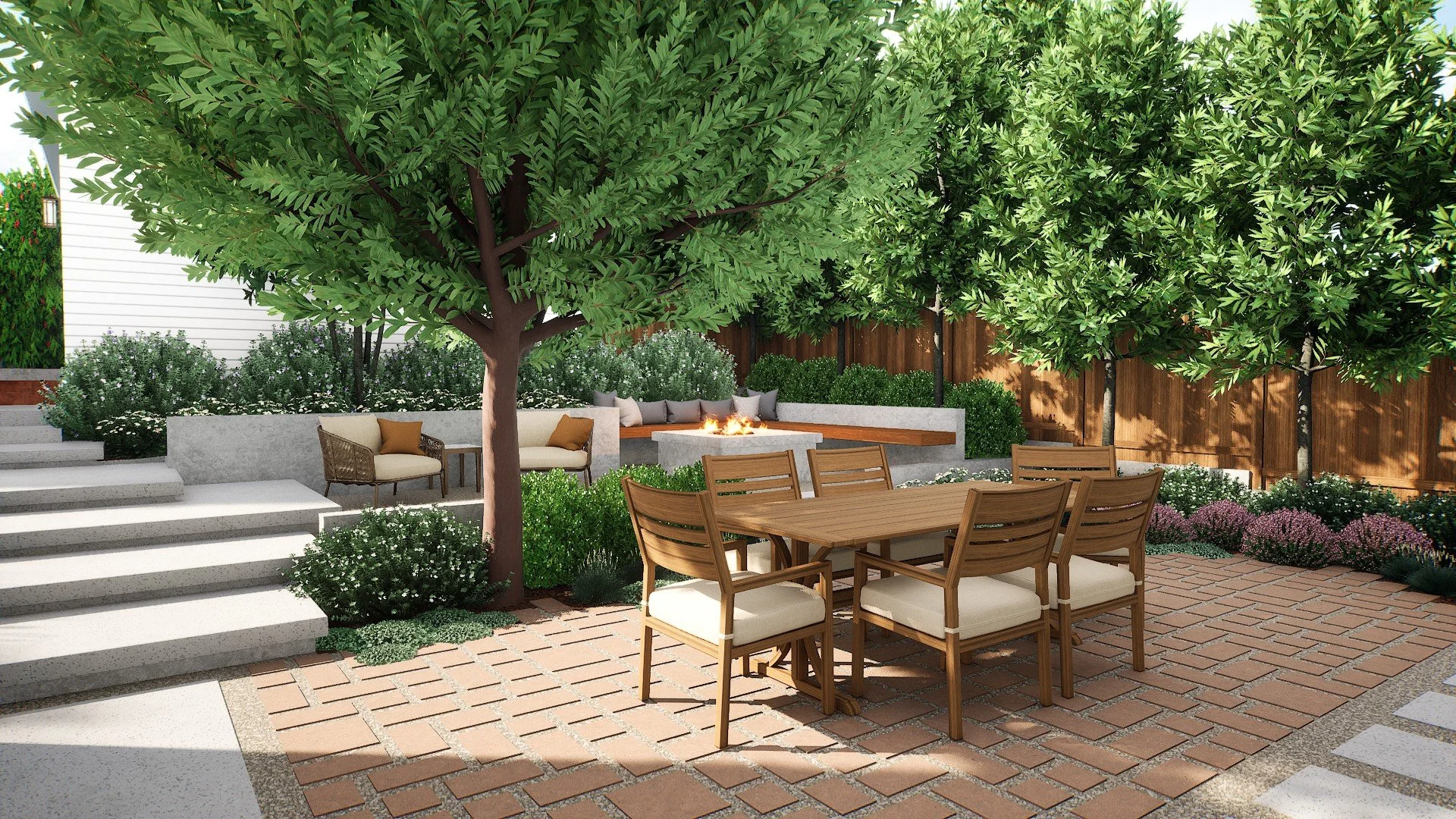 El Segundo backyard with fire pit seating, brick patio, and layered planting in a Mediterranean-inspired landscape design