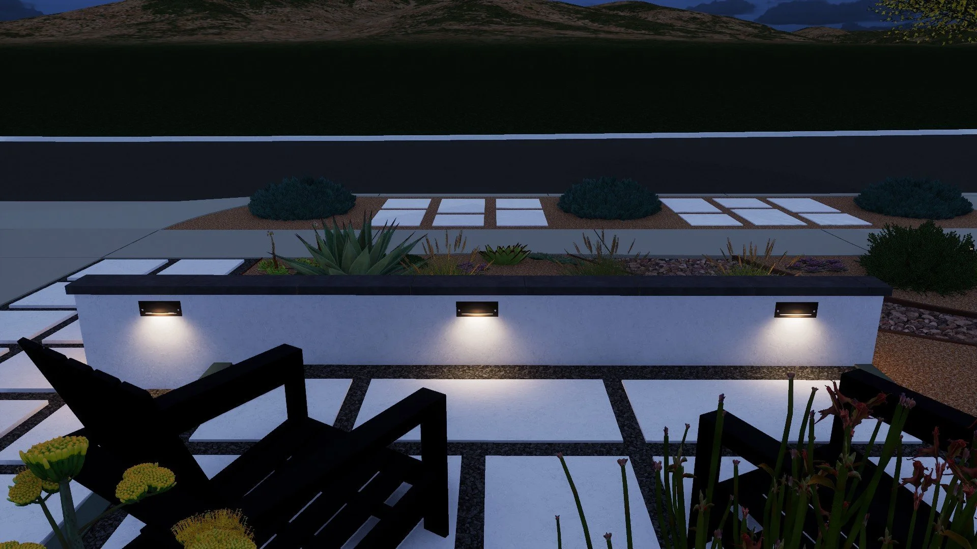 Seating wall with built-in lights in a drought-tolerant front yard
