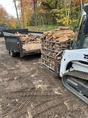 loading-firewood-with-skidsteer.jpeg