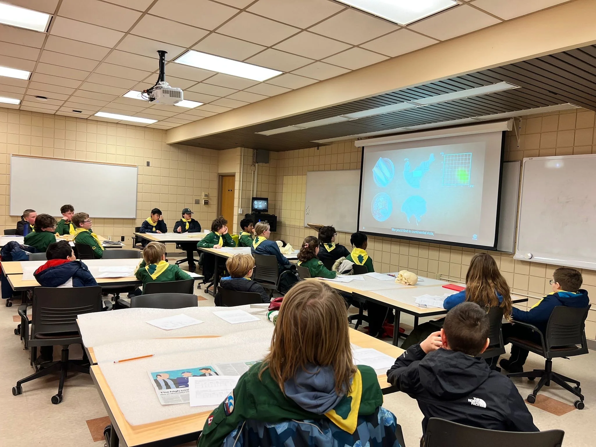 Scouts Canada attending an archaeology and biological anthropology event to earn their scence badges