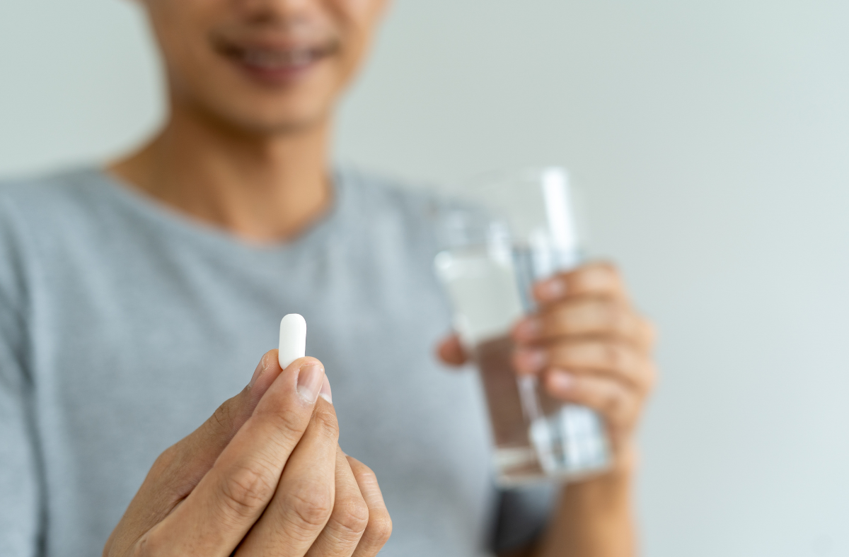 Medication Management: When Willpower is Not Enough - woman taking pill