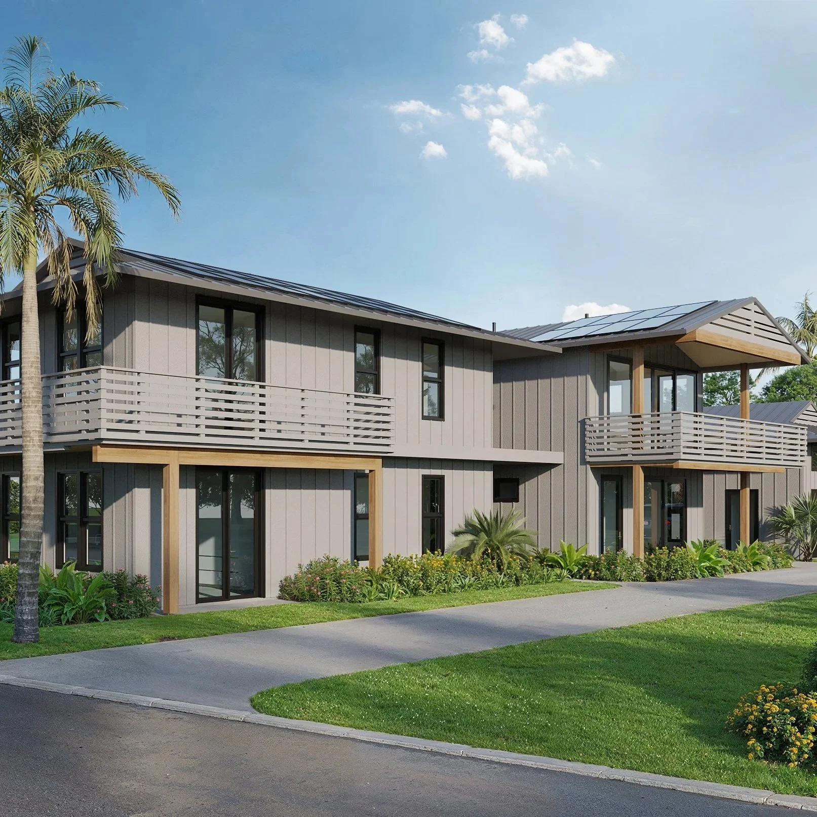 Modern multi-family residential building with gray siding, black window frames, and balconies, set among green landscaping and palm trees, under a partly cloudy sky.