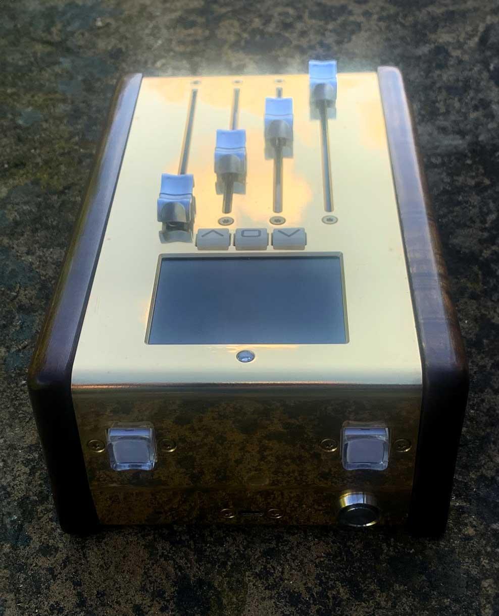 A high end MIDI fader seen from the back showing function buttons
