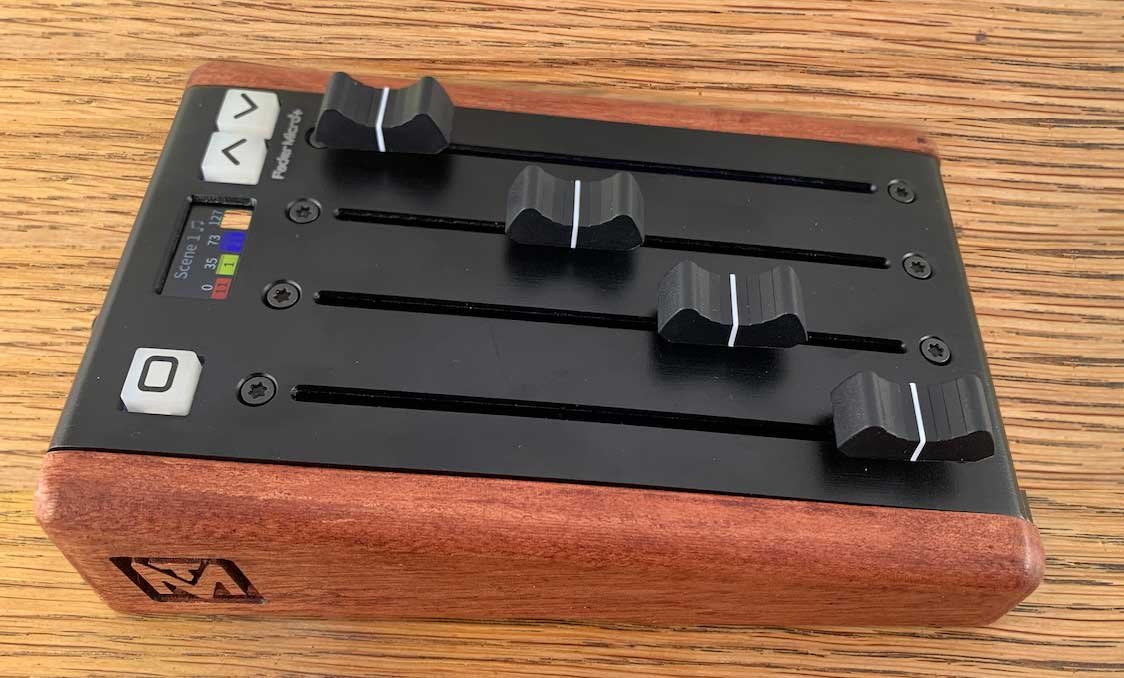 A side view of a tiny 100mm programmable MIDI fader