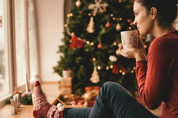 Christmas Day - Relaxing Time Alone by the Tree sipping a hot drink.jpg