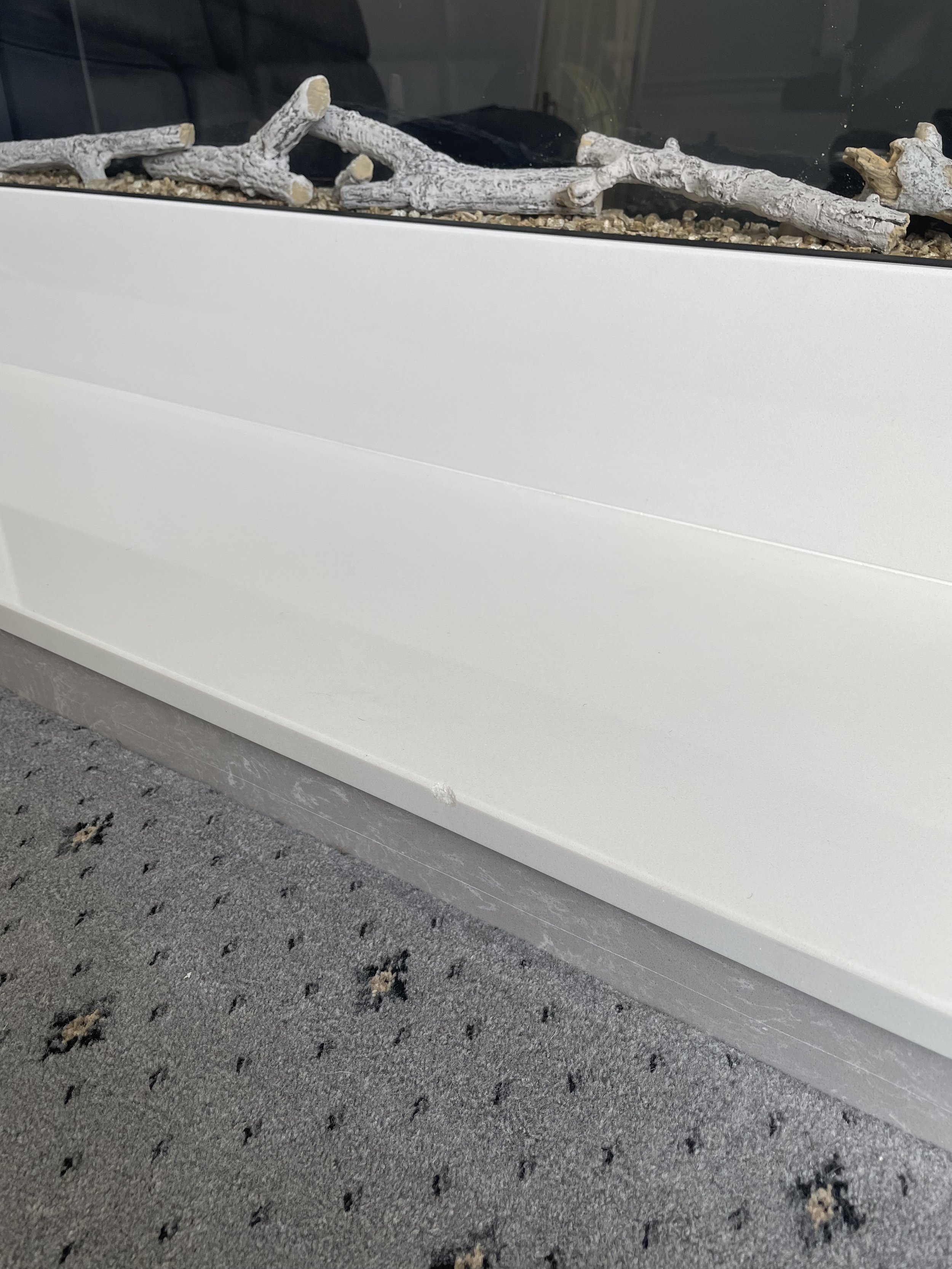 Quartz fireplace damage before.