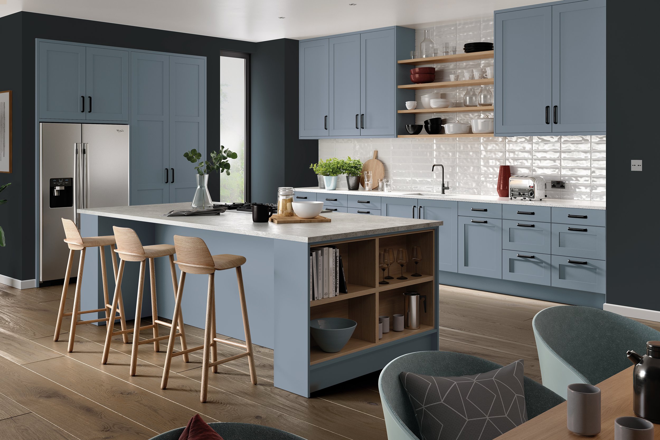 Modern kitchen with blue cabinets, large island with wooden stools, stainless steel appliances, open shelves, and wooden floors.
