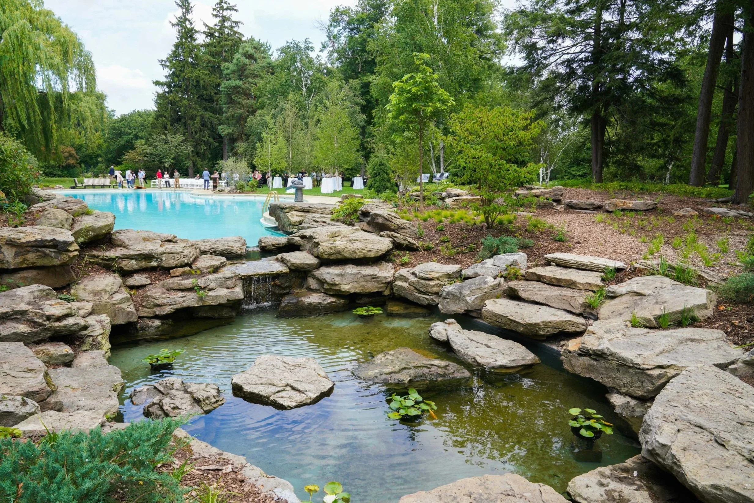 Restored historic pool and lagoon at Edsel & Eleanor Ford House, landscape restoration by Albert Kahn Associates
