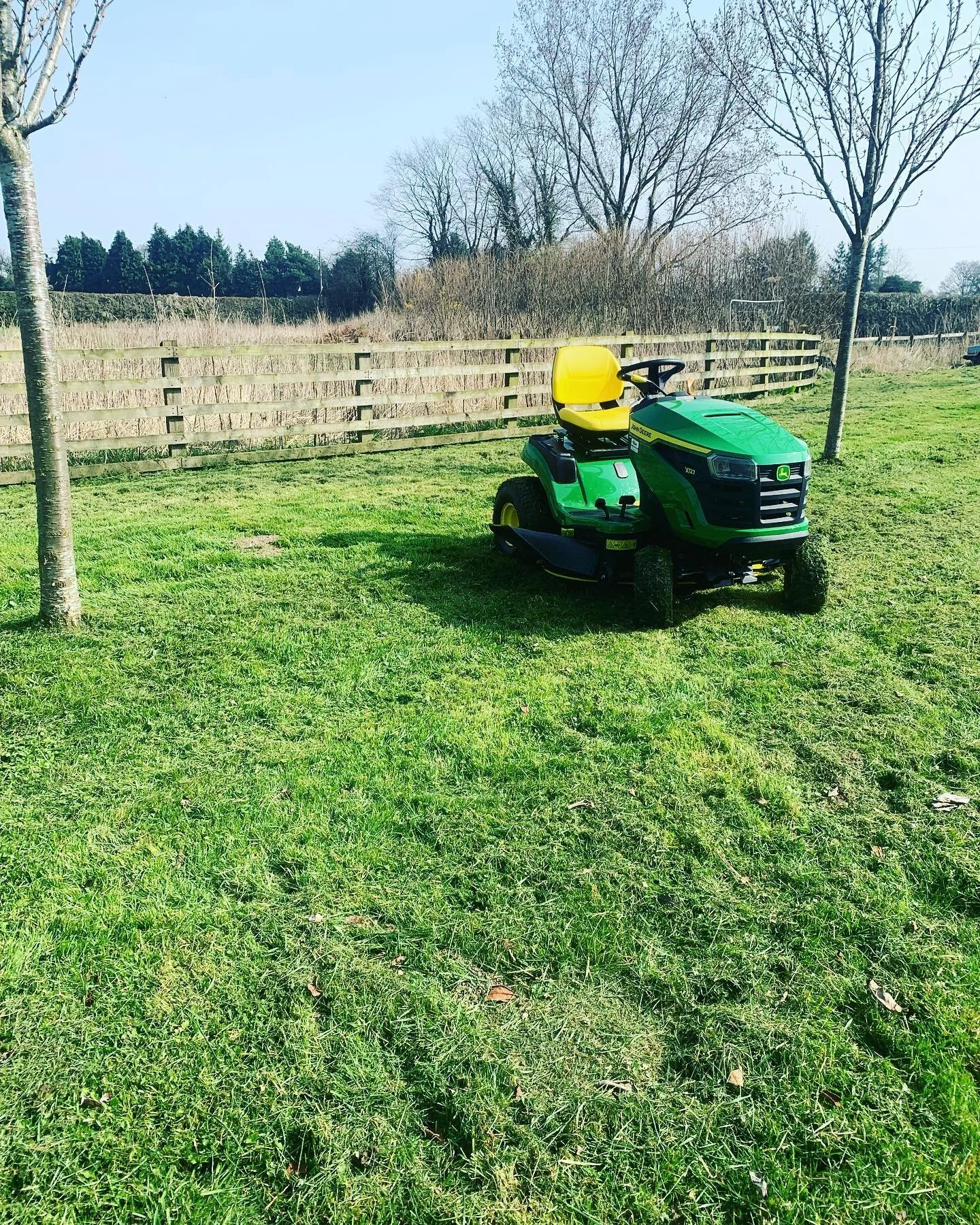 One of our fleet of lawn tractors ready to mow the larger areas #grass #grasscutting #lawntractor #cheshire #johndeere #contractor