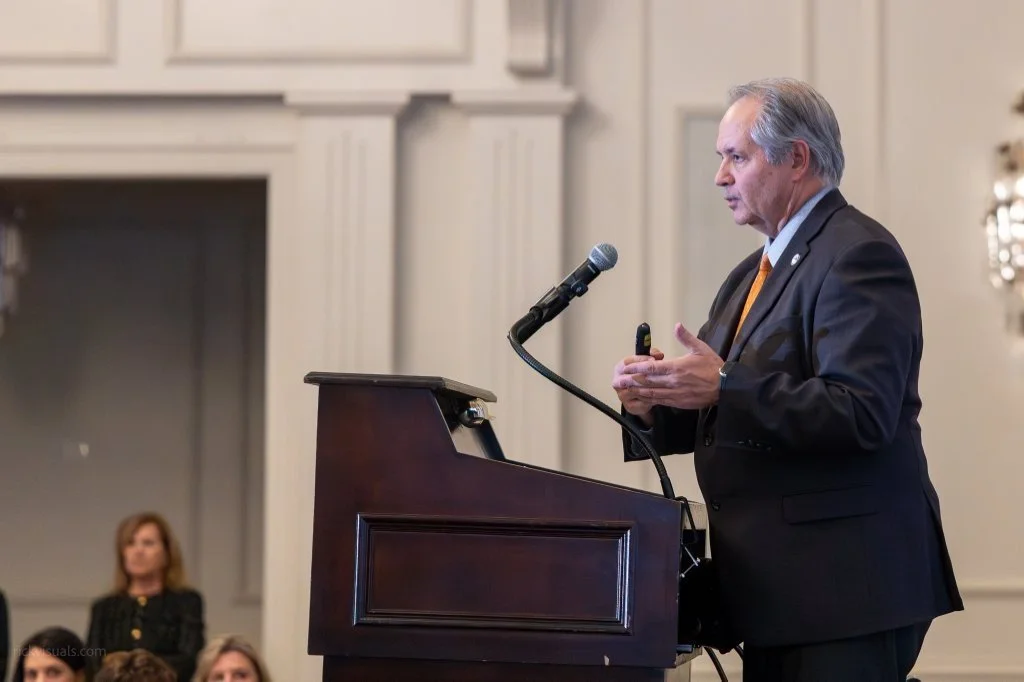 Mark Wilson podium speaking.jpg