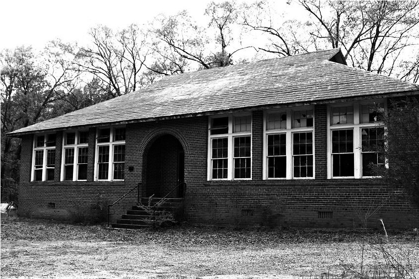 Eerie Abandonment – Black and White Photo of an Abandoned School