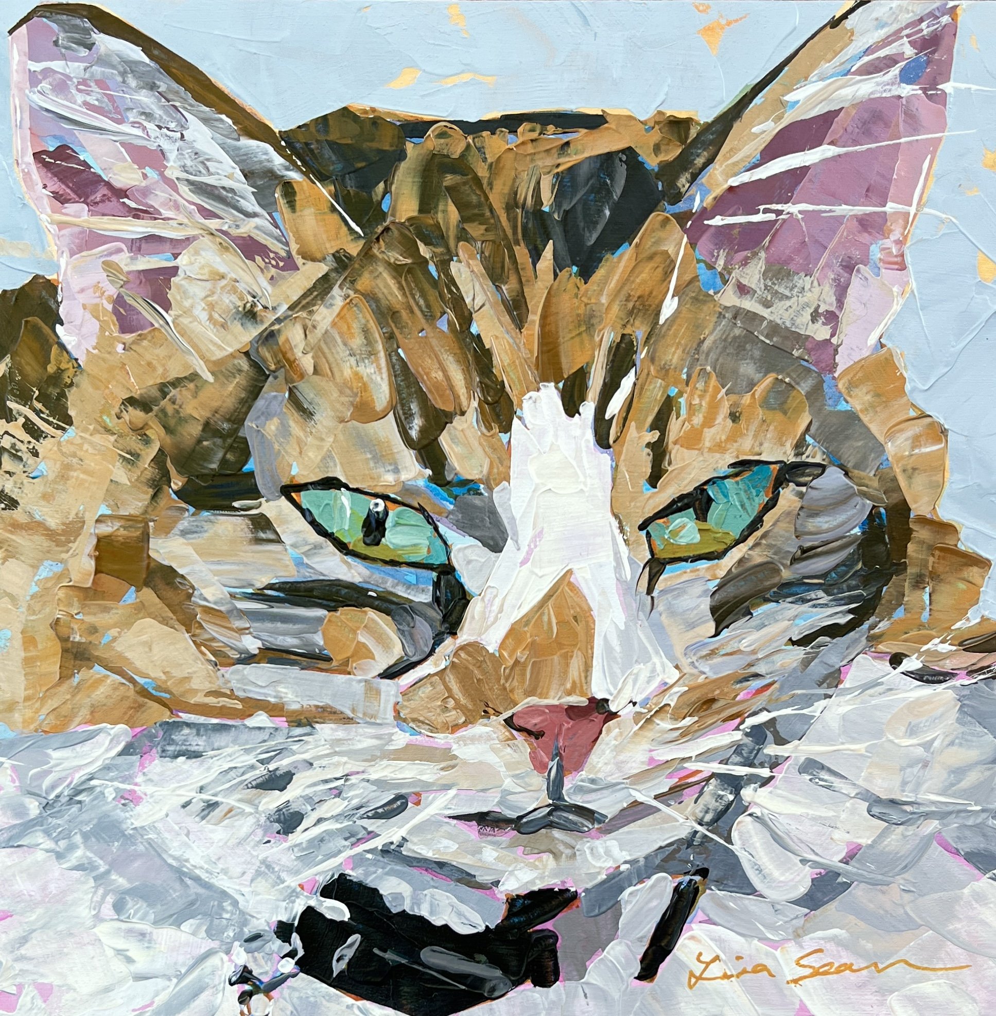 Cat portrait with green blue eyes