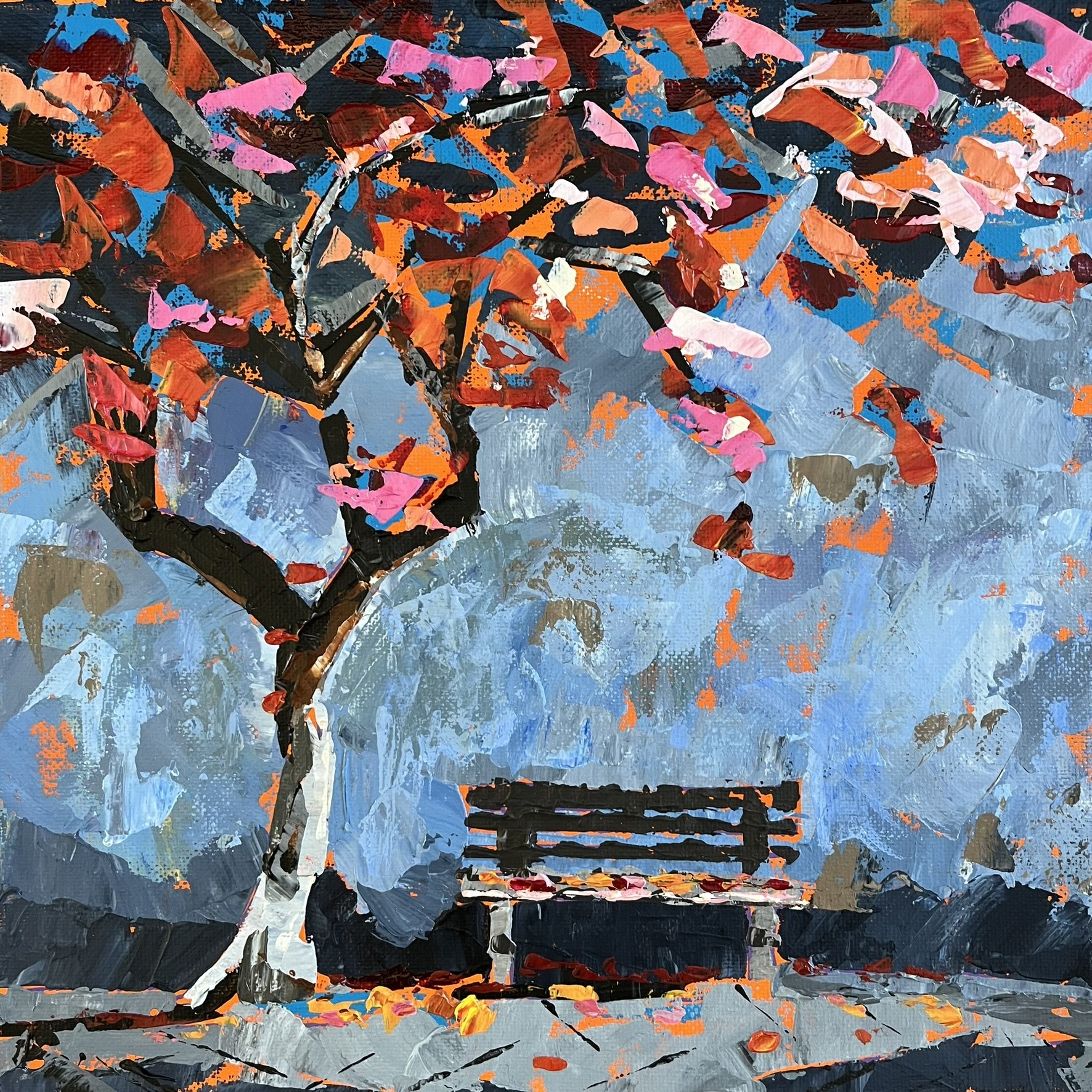 Bench with colorful tree