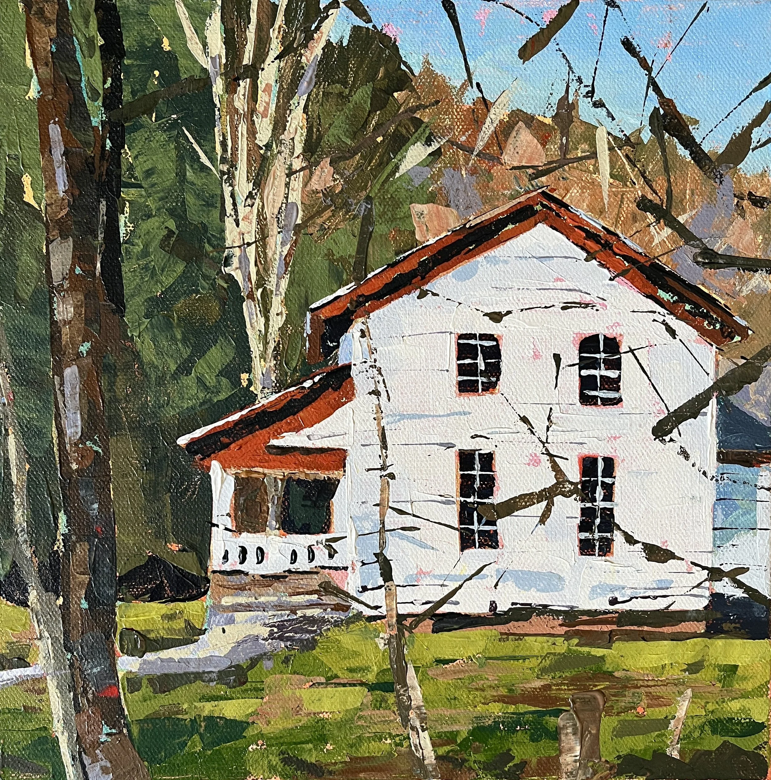 a white house int he woods
