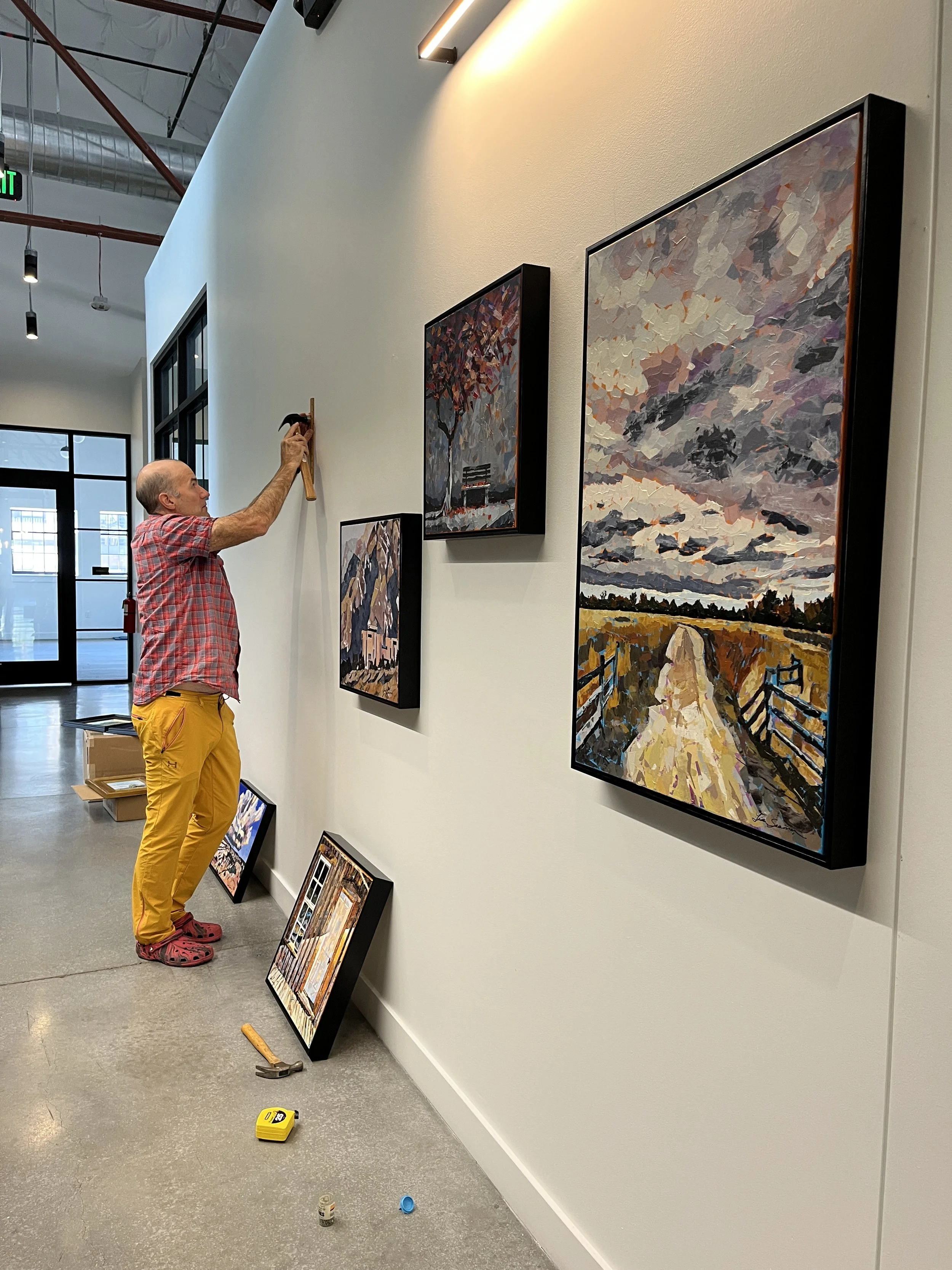 Bart hanging paintings