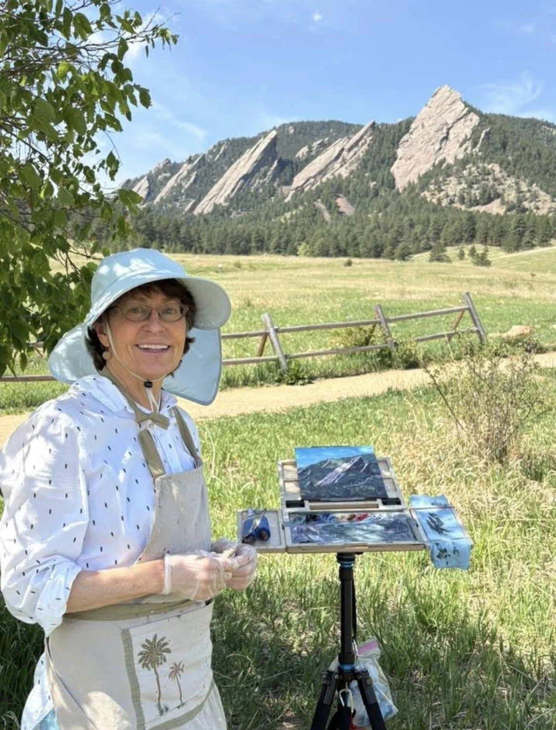 Lisa painting the third flatiron in Chautauqua field