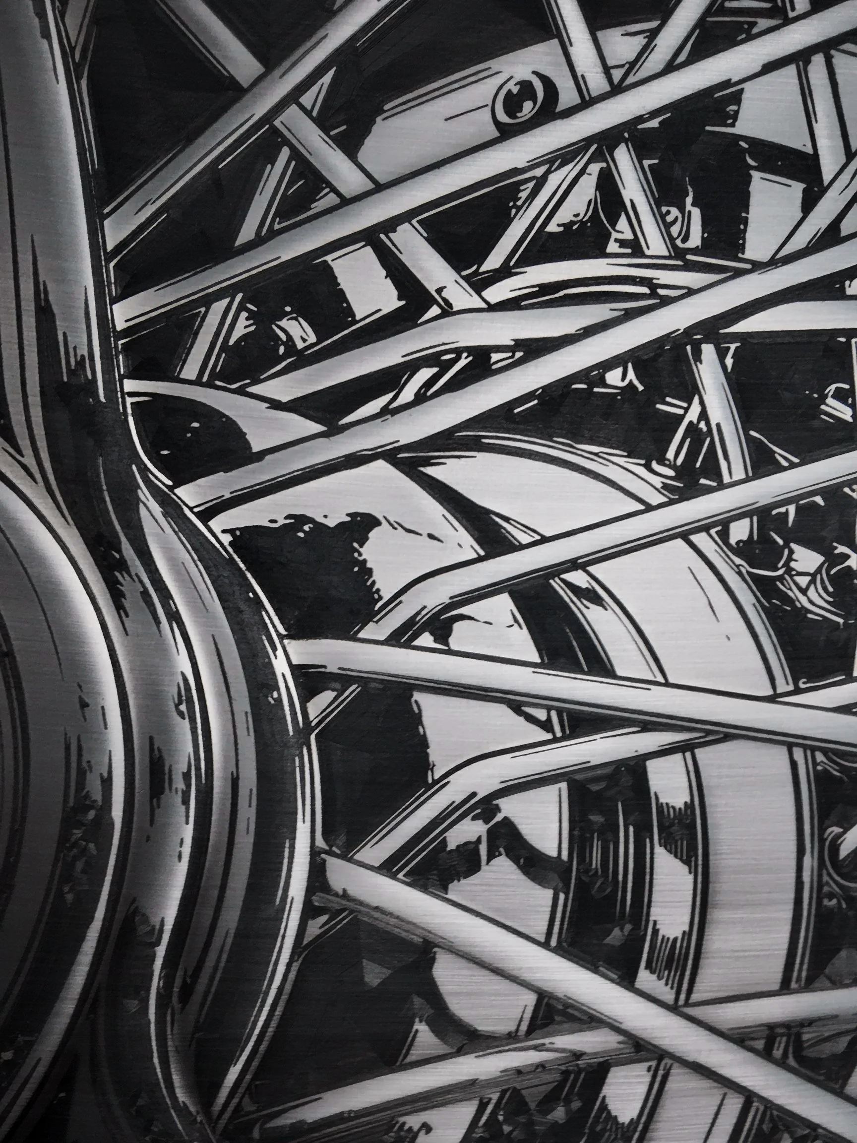 Close-up of multiple black and white stylized tire rims stacked together.