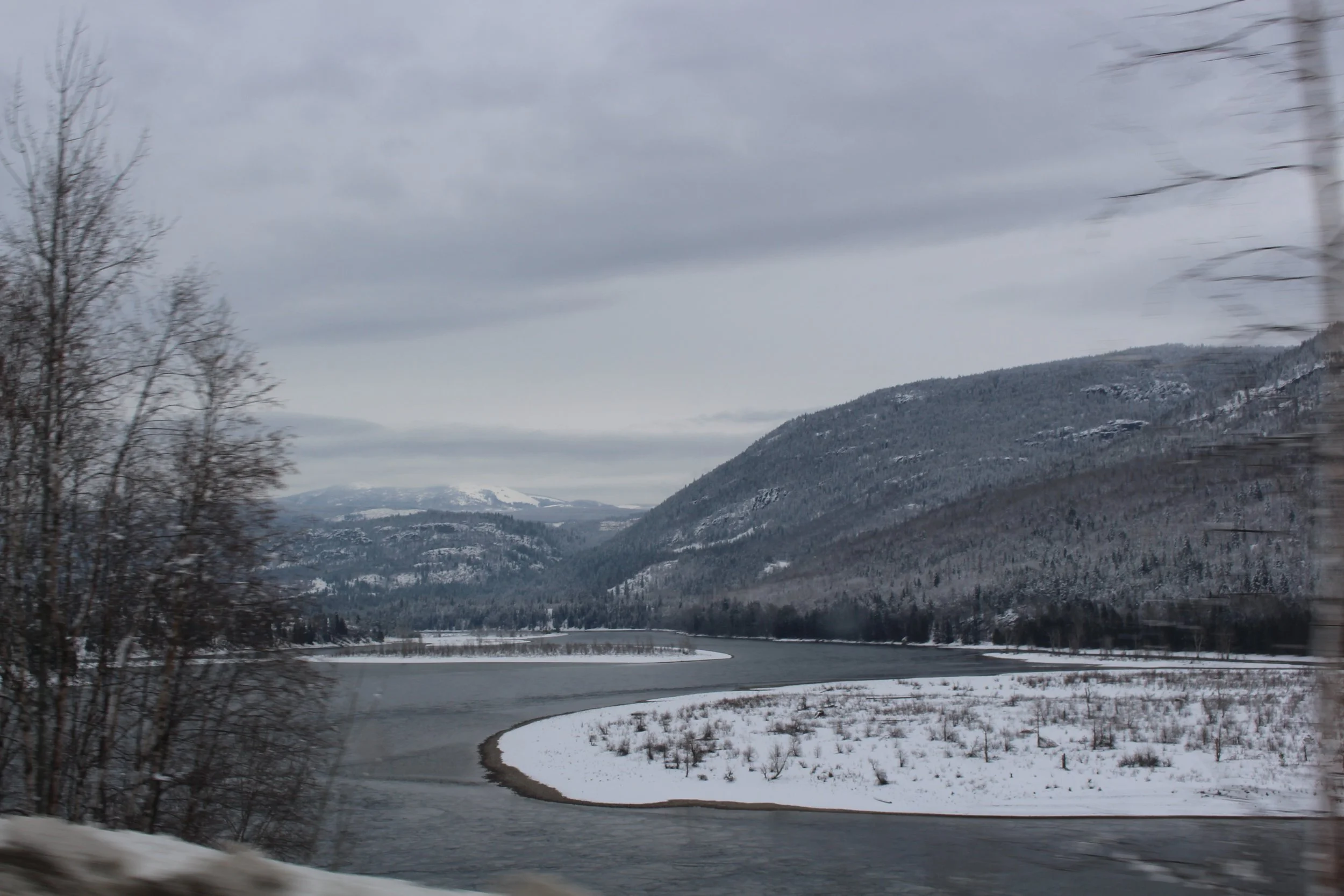 Wintery Colombia River before driving through Genelle, British Colombia Dec 2017