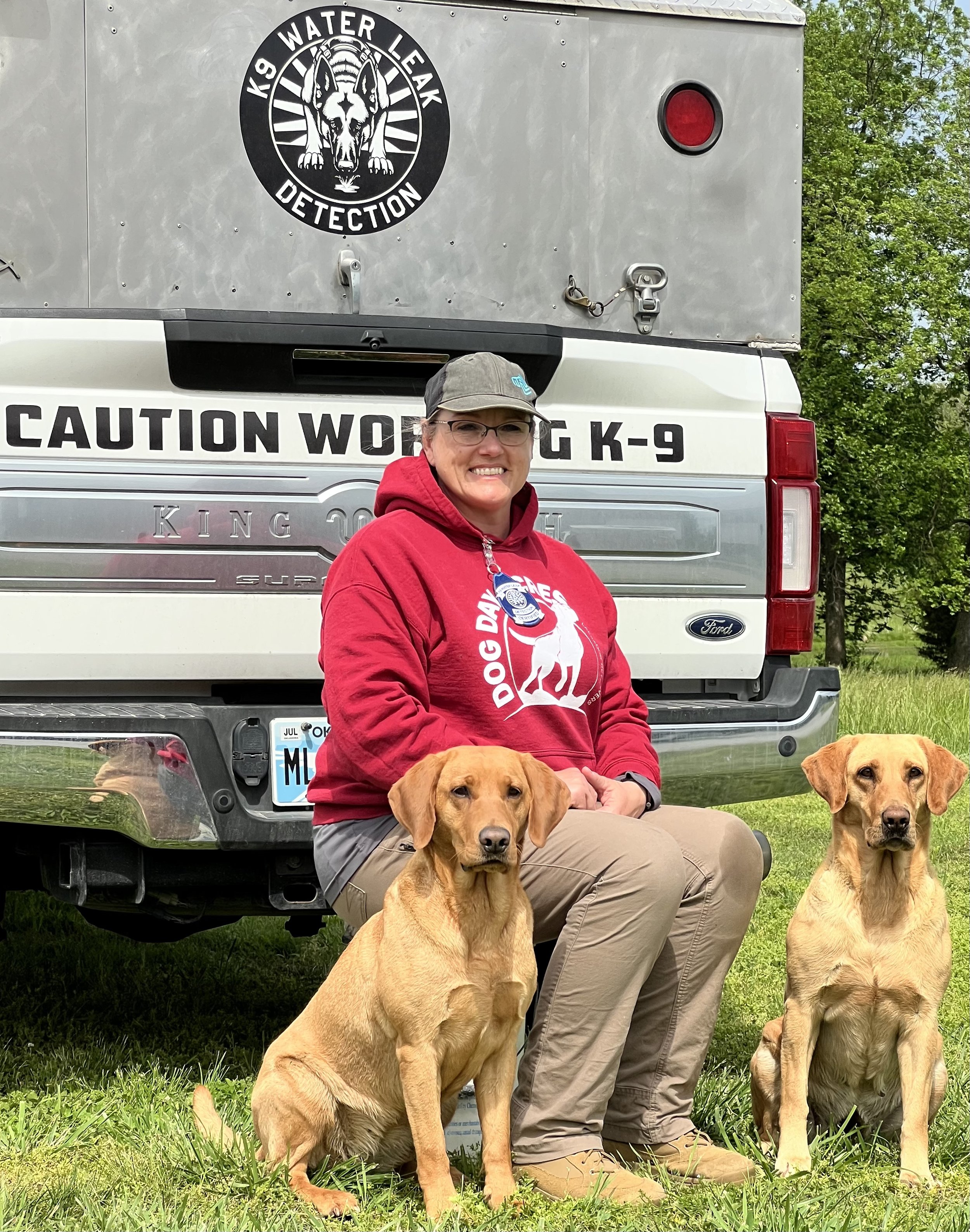Robin with her 2 dogs Flash and Flare, both certified K9 Water Leak Detection 2026