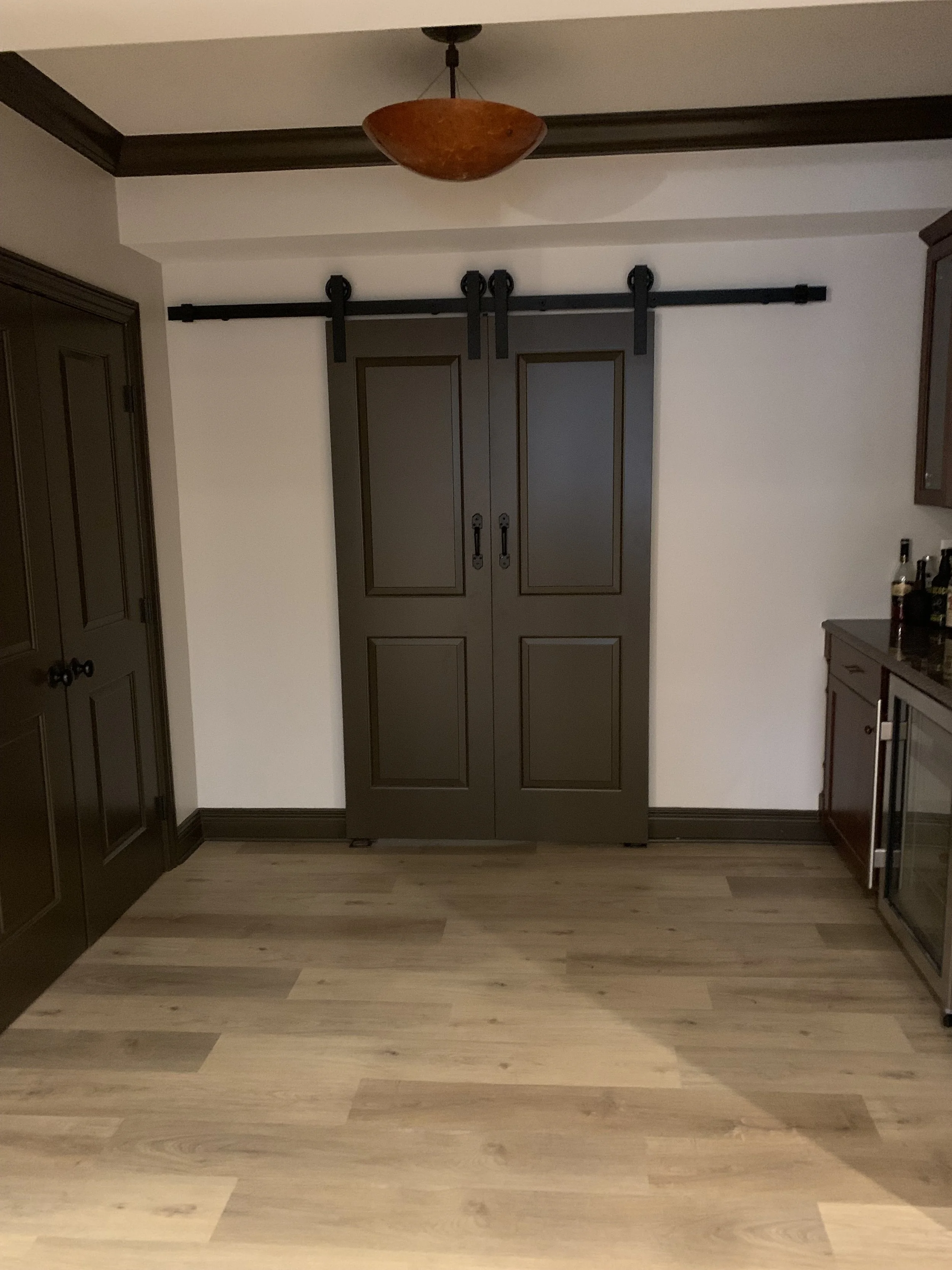 Custom barn door basement remodel Ann Arbor