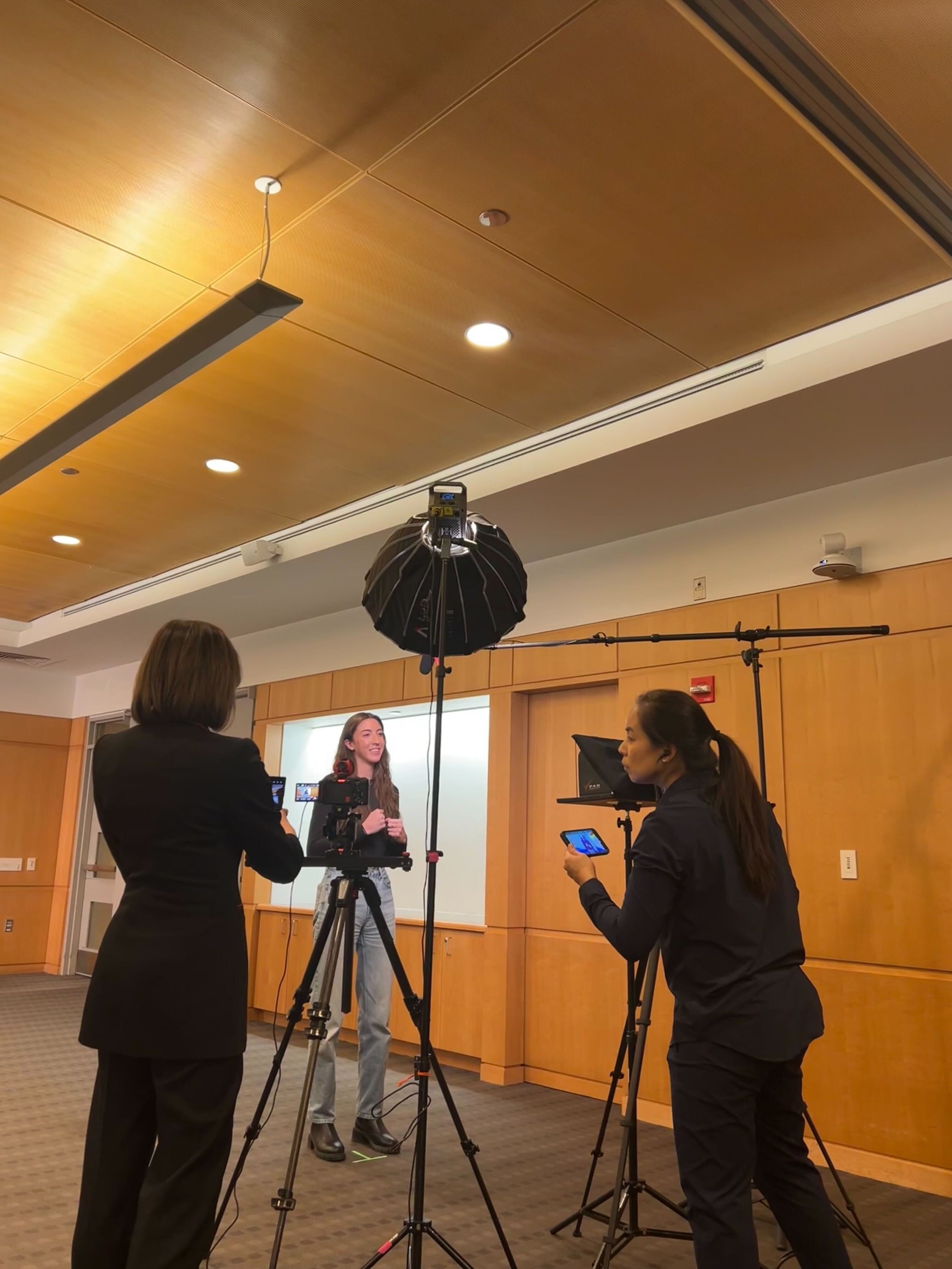Zoe filming a video about her research!