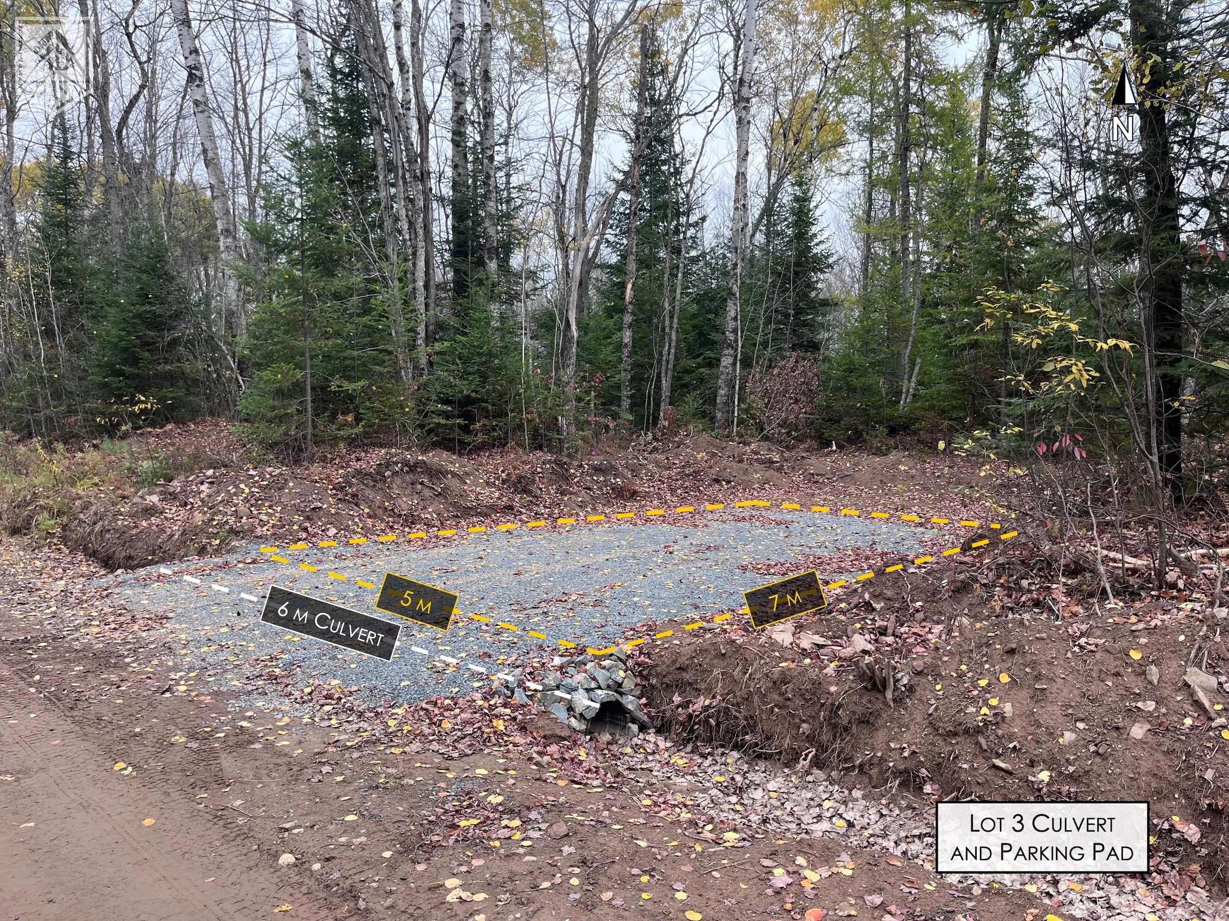 A forested construction site showing a lot 3 culvert and parking pad. The lot is outlined with yellow dashed lines, with measurements of 5 meters and 7 meters on the sides. A black sign indicates a 6-meter culvert and a white label notes 'Lot 3 Culve