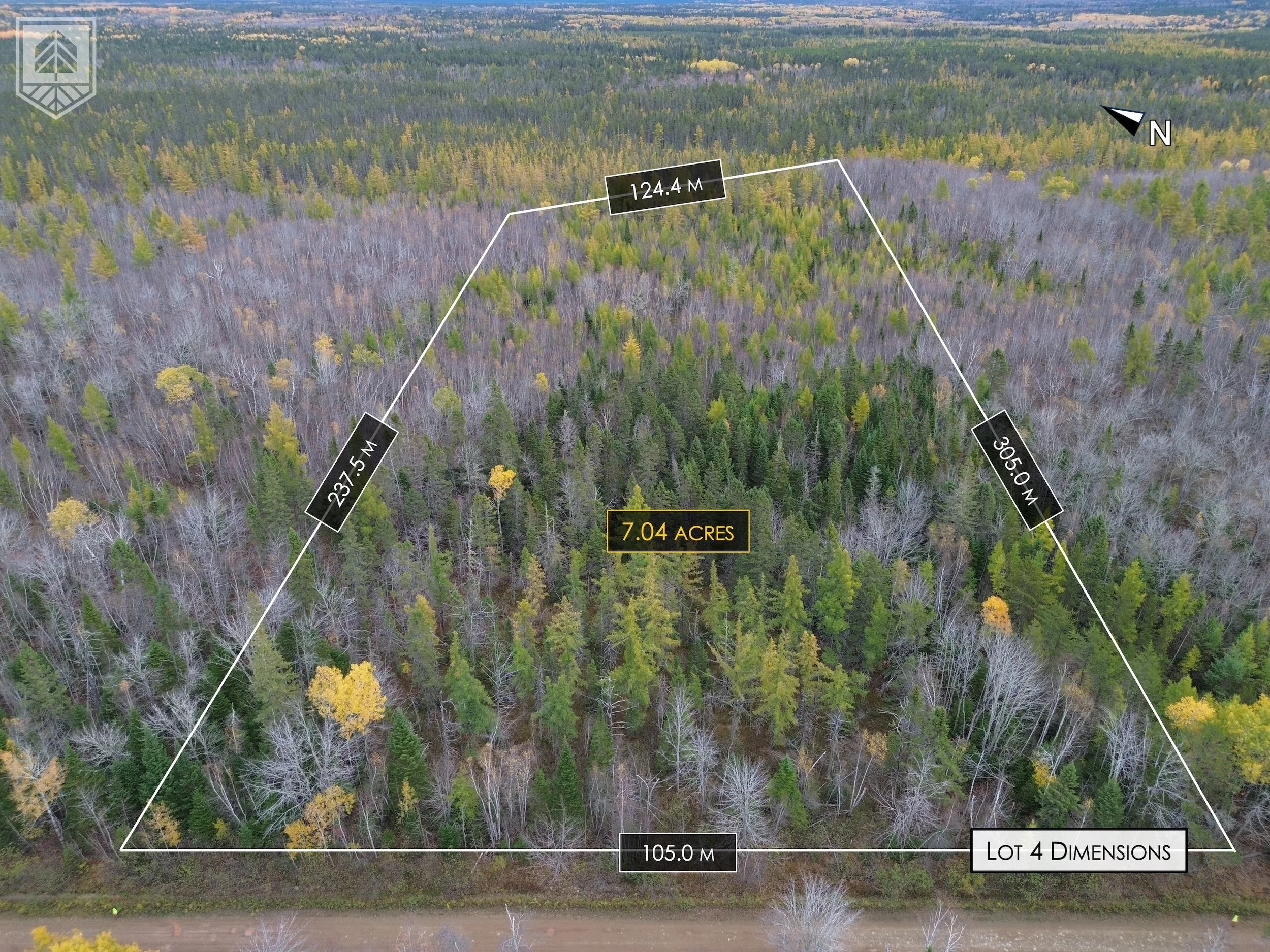 Aerial view of a wooded lot with latitude and longitude measurements on each side, totaling 7.04 acres, with varying tree colors and a road at the bottom.