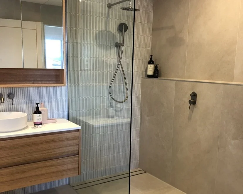 modern bathroom renovation with glass shower screen, floating vanity